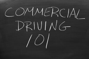 Blackboard with “commercial driving 101” written in chalk